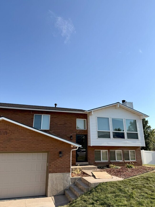 Building Photo - Spacious Comfort Meets Practical Living in...