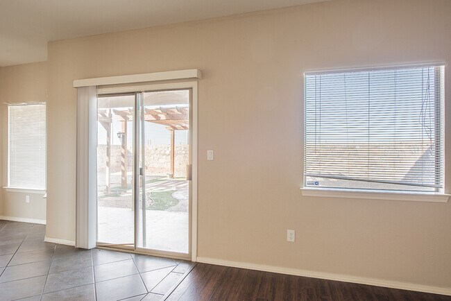 Building Photo - Beautiful 4-Bedroom Home with Custom Backy...