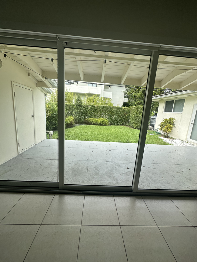 View of private backyard from living room - 5400 Orduna Dr