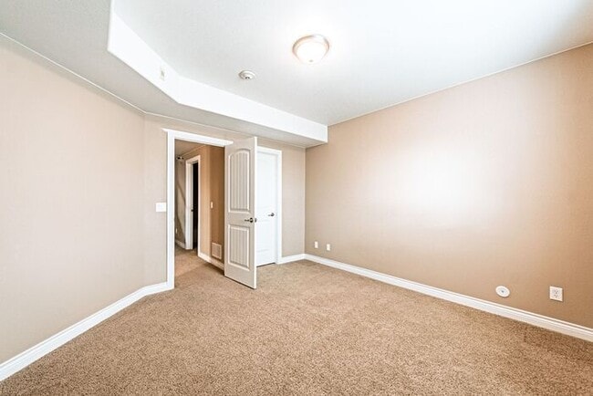 Building Photo - Stunning 5BR Home with Luxury Master Suite & Low-Maintenance Yard!