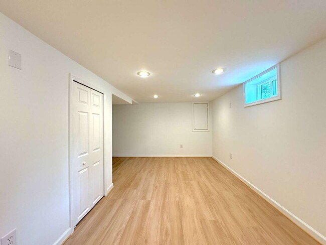 Building Photo - Charming 2BR Townhome with Finished Basement, Fenced Yard & Private Driveway Near Huntington Metro