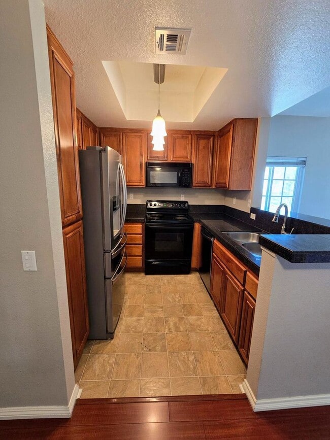 Building Photo - Spacious Remodeled Condo at River Colony Community in Mission Valley