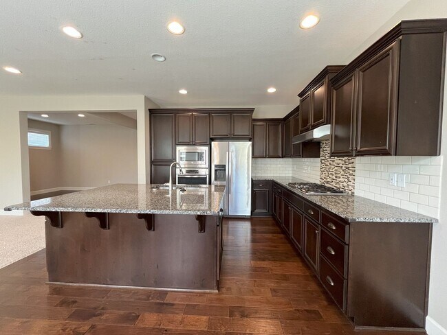 Building Photo - Spacious 4-Bedroom + Bonus Room with Moder...