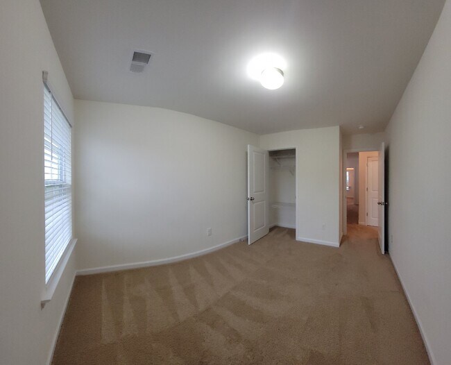 Building Photo - "Modern 3-Bedroom Multiplex with 3 Full Ba...