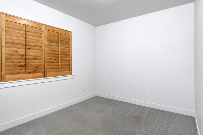 Building Photo - Unfurnished Condo Retreat with Modern Comf...