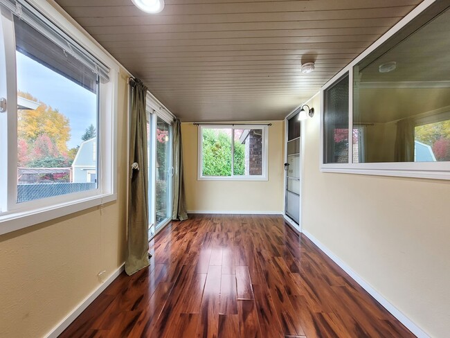 Building Photo - Charming Rambler with Abundant Natural Lig...