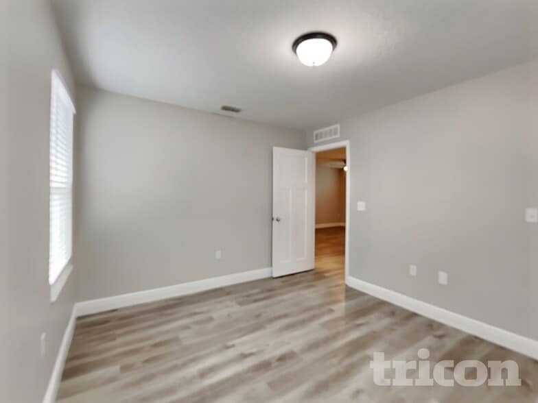 Building Photo - 7105 Feather Wood Dr