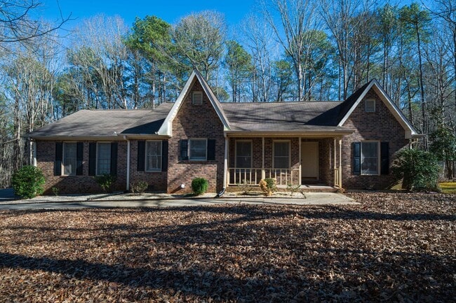 Building Photo - Move-In Ready Brick Ranch on Wooded Acre in Hampton Woods!