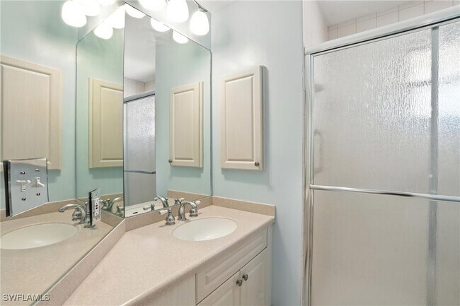 Building Photo - 7032 Pelican Bay Blvd
