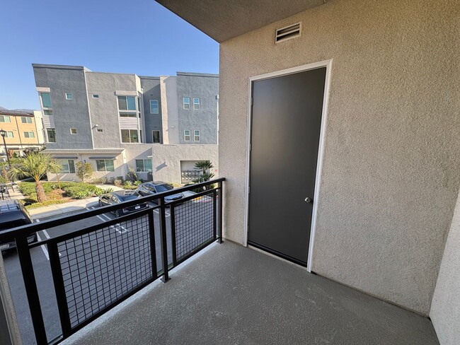 Building Photo - Brand New 1 bedroom, 1 bath Townhome with 2 car tandem garage for lease