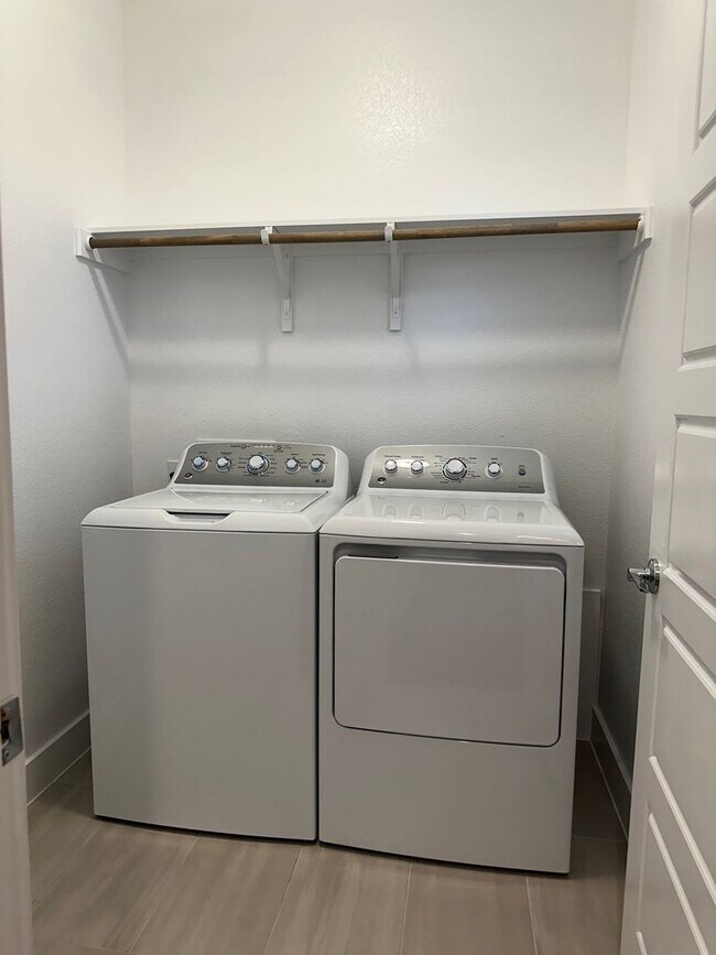 Building Photo - For Lease – Modern 2023 Condo Backing to Greenbelt | Creekside at Pioneer Crossing West