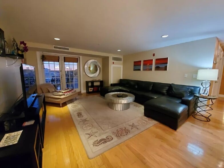 view of living room - 1 E Grand Ave