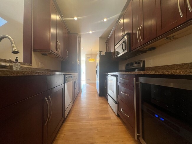 Building Photo - Beautiful 4 Bedroom/ 2.5 Bath with Integra...