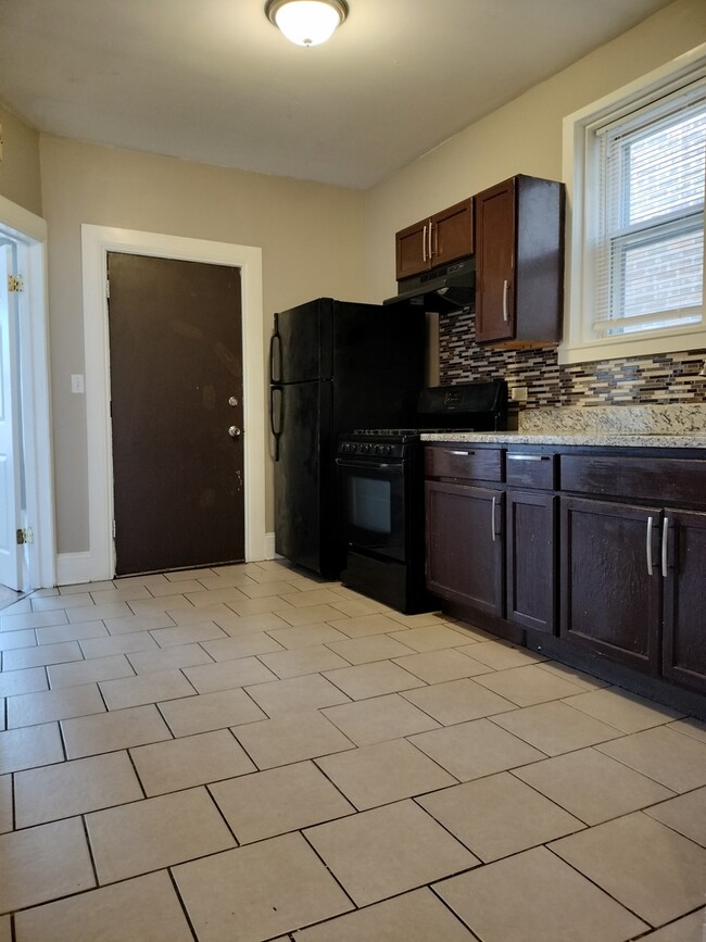 Building Photo - 7729 S Essex Ave