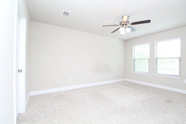 Building Photo - Spacious 3-Bed, 2.5-Bath Townhome Steps from Blue Wahoos Stadium & Palafox Street with Upgraded K...