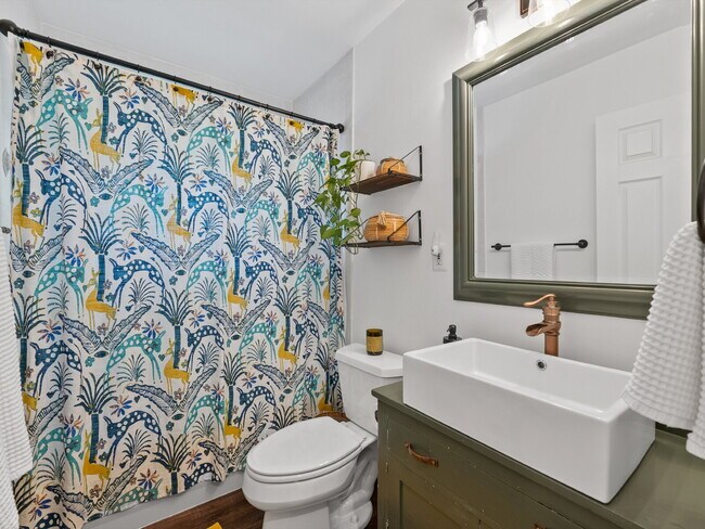 Building Photo - Beautifully Updated Home with Finished Lower Level, Fenced Yard & Exceptional Outdoor Living