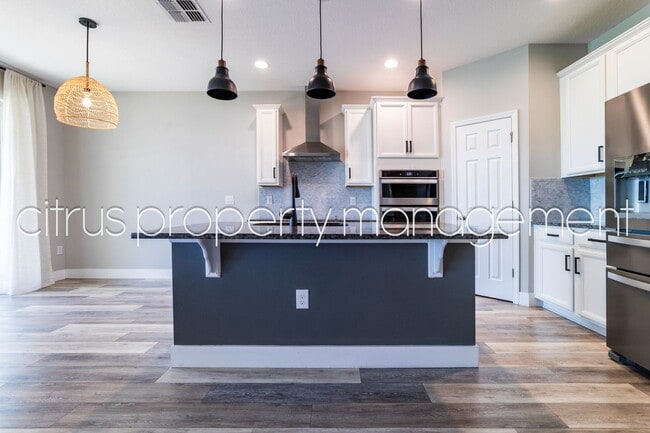 Building Photo - Stunning Double Waterfront 4/3 Home with Dock and Electric Boat Lift