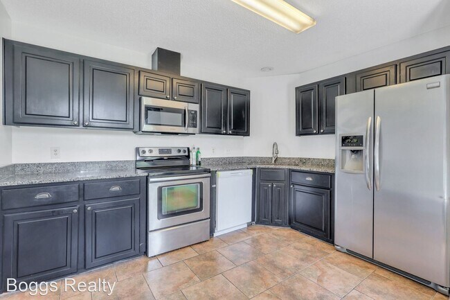 Building Photo - 4 br, 2.5 bath House - 1950 Woking Court