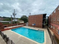 Building Photo - Treetop Living in the Heart of Highland Park