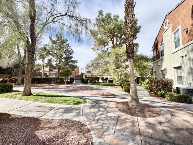 Building Photo - DOWNSTAIRS CONDO | GATED COMMUNITY | CENTENNIAL HILLS | UPDATED 3 BEDROOM