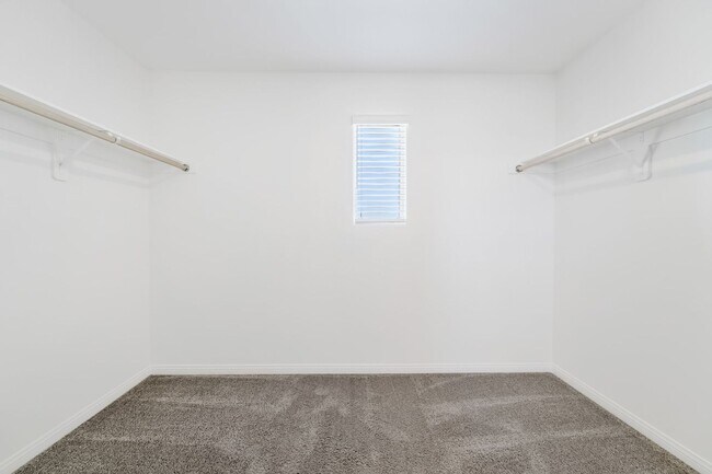 Building Photo - Modern Mosaic Townhome with Stylish Finishes & Resort-Style Community Amenities!
