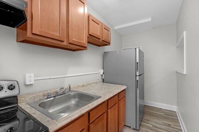 Building Photo - Charming Updated Rowhome in Belair-Edison – Move-In Ready!
