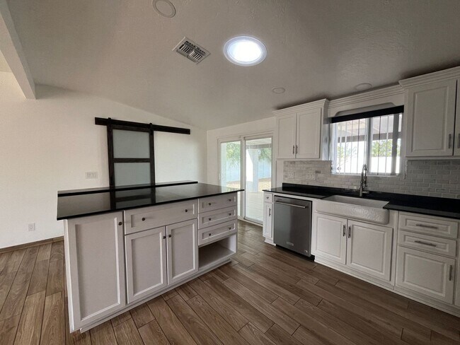 Building Photo - Gorgeous fully remodeled centrally located 3 bedroom home.