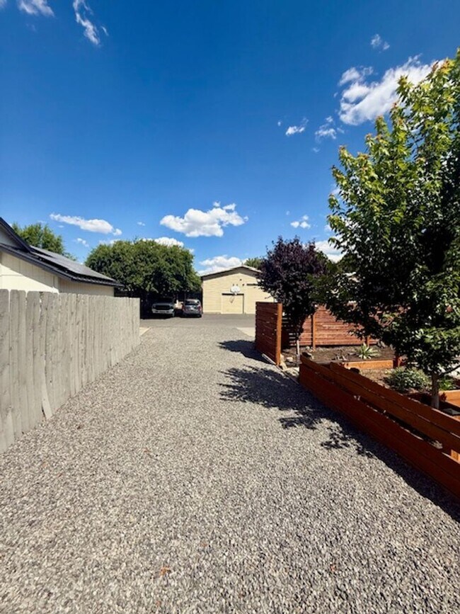 Building Photo - Serene Remodeled 4 Bedroom on Large Lot w/...