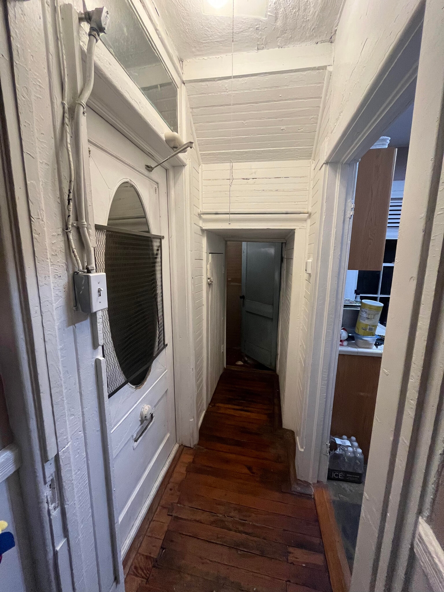 Occupied Hall - front door on left, laundry at the end, kitchen on right - 1215 Java Pl