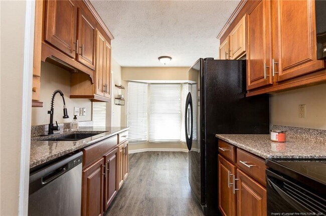 Building Photo - 6944 Calamar Dr