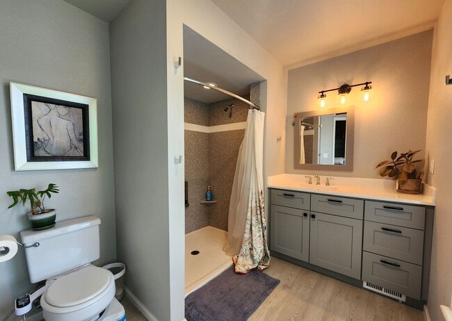 Building Photo - Stunning 3 Bedroom Townhome Tucked Away In...