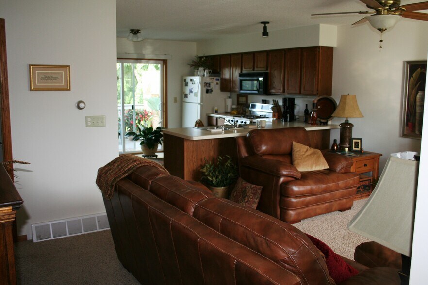 Open kitchen living room area. - 981 11th Ave S