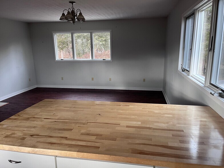 View into living room from kitchen. - 2353 Lusters Gate Rd
