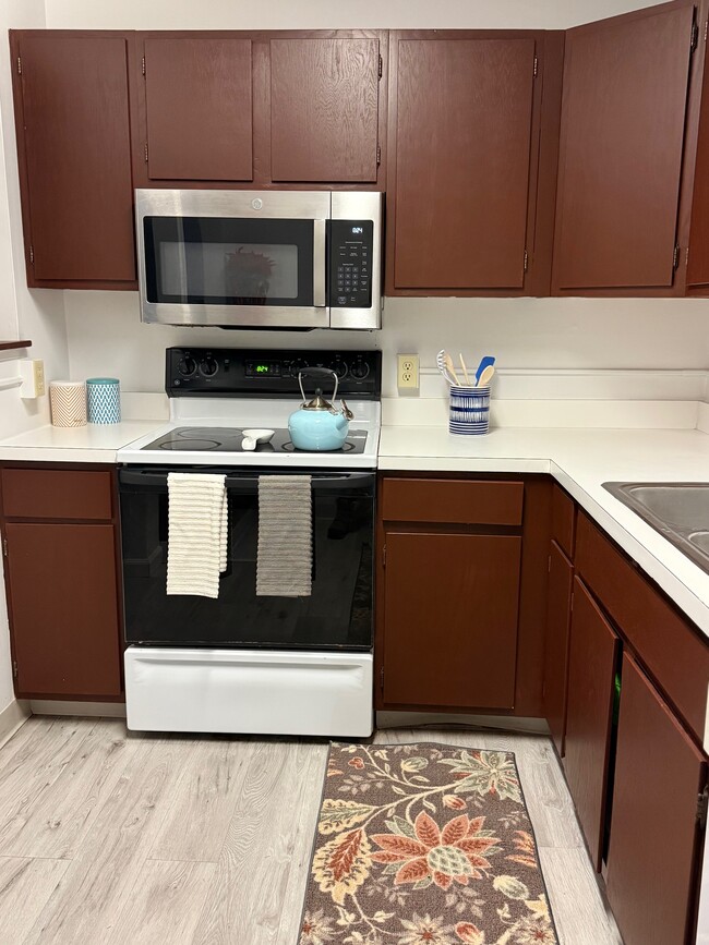 Kitchen with soild surface cooking. - 1053 Danby Rd