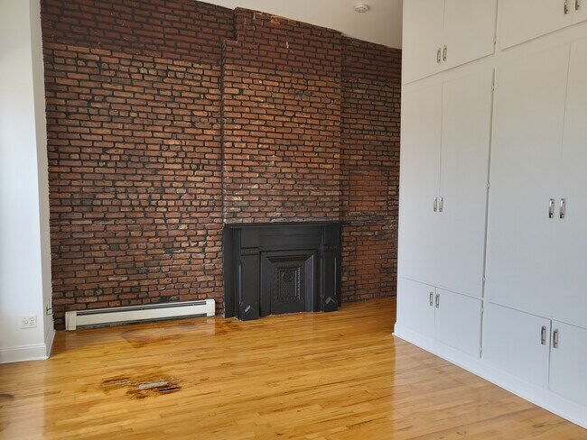 Floor to Ceiling Exposed Brick Wall - 506 Greene Ave