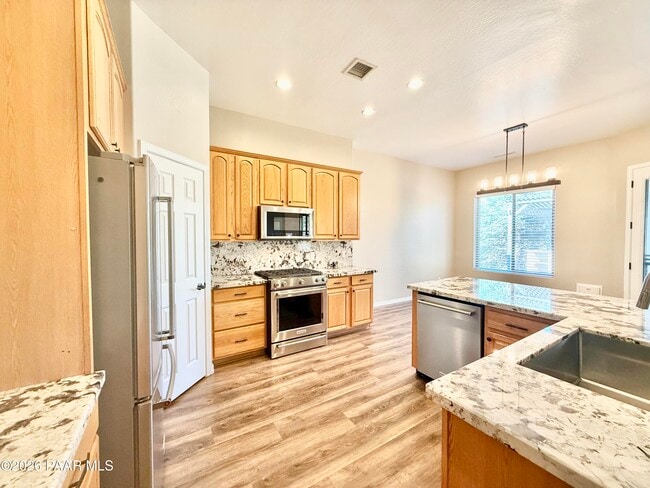 Building Photo - 7861 N Rambling Ln