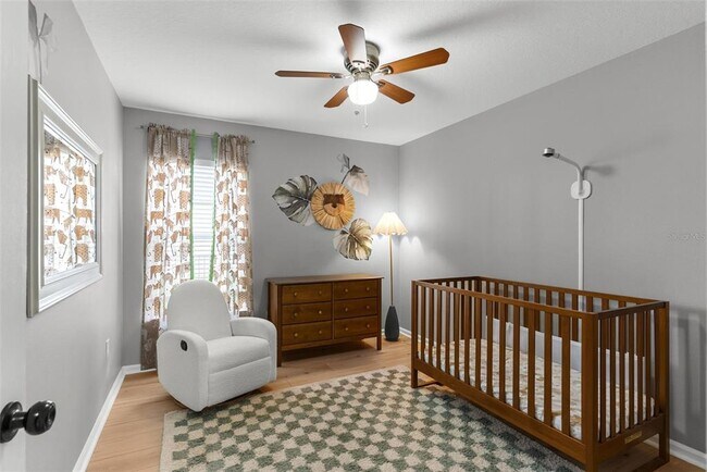 Building Photo - 7619 Crescent Palm Dr