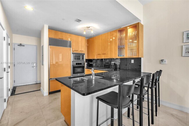 Building Photo - 6799 Collins Ave