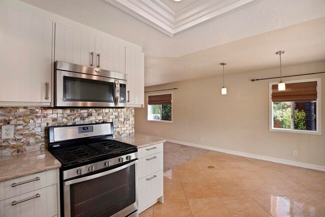 Building Photo - 4 Bed/2.5 Bath Home in Poway. Open Floor Plan, AC/Heat, W/D + Laundry Room and 3 Car Garage!