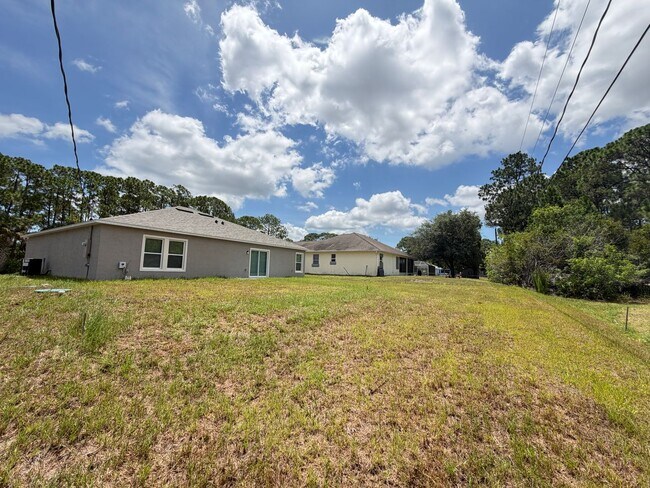 Building Photo - Brand-New 4BR Palm Bay Retreat Designed for Modern Living! NEW BUILD HOME!