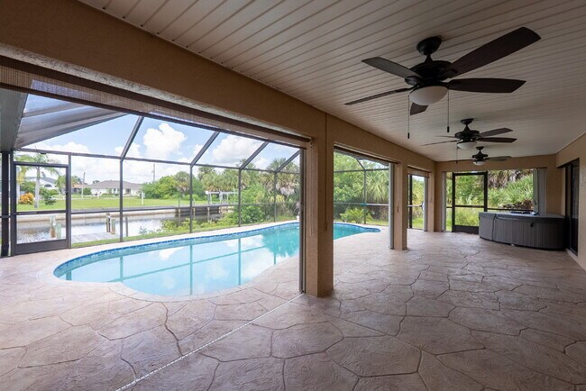 Building Photo - 3 BEDROOM • 2 BATHROOM • PRIVATE POOL • WATERFRONT • BOAT LIFT • ZERO DEPOSIT MOVE-IN AVAILABLE