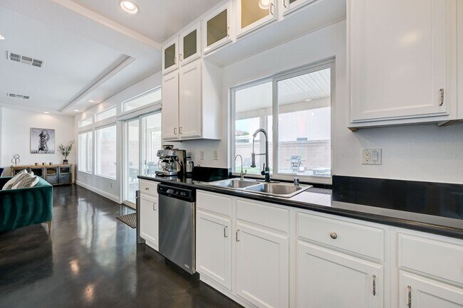 Building Photo - FANTASTIC FULLY UPGRADED FURNISHED RENTAL LOCATED IN THE SOUTHWEST!!!