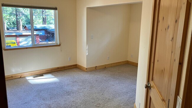 Building Photo - Large home with garage and fenced backyard