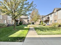 Building Photo - Spacious 2 Bed Condo with Attached Garage