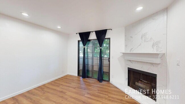 Building Photo - 10220 De Soto Ave