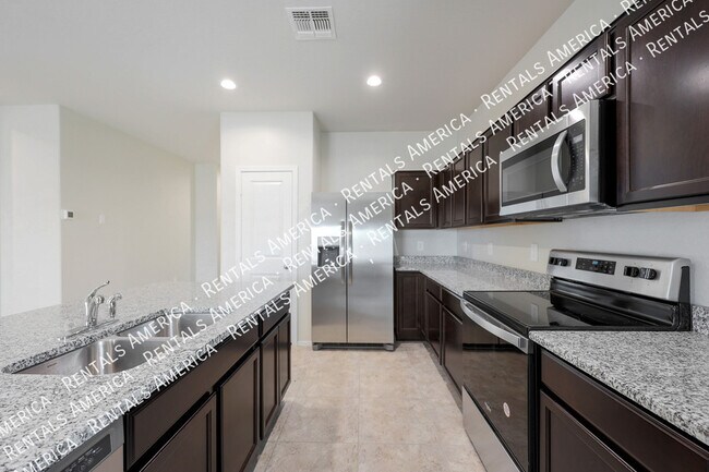 Building Photo - 18436 W Artemisa Ave