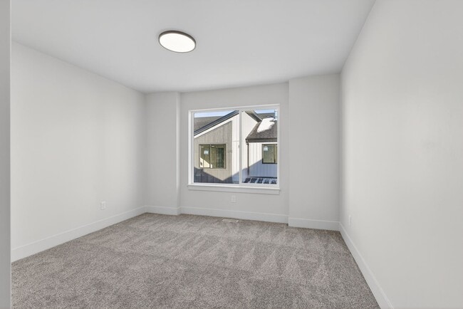 Building Photo - $500 off first month - BRAND NEW 3 BED 2.5 BATH TOWNHOMES WITH 2 CAR GARAGE