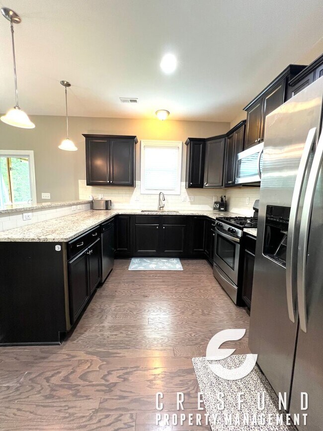 Building Photo - Gated Community 4 BR 2.5 Bath Coming Soon ...