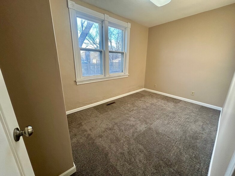 Bedroom 2 with BRAND NEW Carpet - 213 Lake Ave W