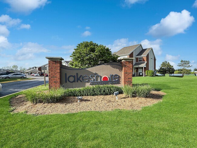 Building Photo - Luxe 1-Bedroom Haven: Serene Lakeside Living at Lakeshore Community